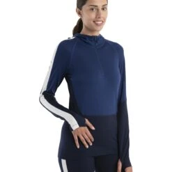 Icebreaker T-Shirt Manches Longues à Capuche Femme - 200 Sonebula Half Zip - Midnight Navy/Royal Navy/Snow -Icebreaker icebreaker womens 200 sonebula half zip long sleeve hood shirt midnight navy royal navy snow 3 1555377