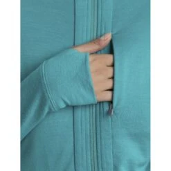 Icebreaker Veste à Capuche Couche Intermédiaire Femme - Quantum III - Flux Green/Ether 14 Icebreaker Veste à Capuche Couche Intermédiaire Femme - Quantum III - Flux Green/Ether -Icebreaker icebreaker womens quantum iii long sleeve zip hood midlayer flux green ether model 4 1535760